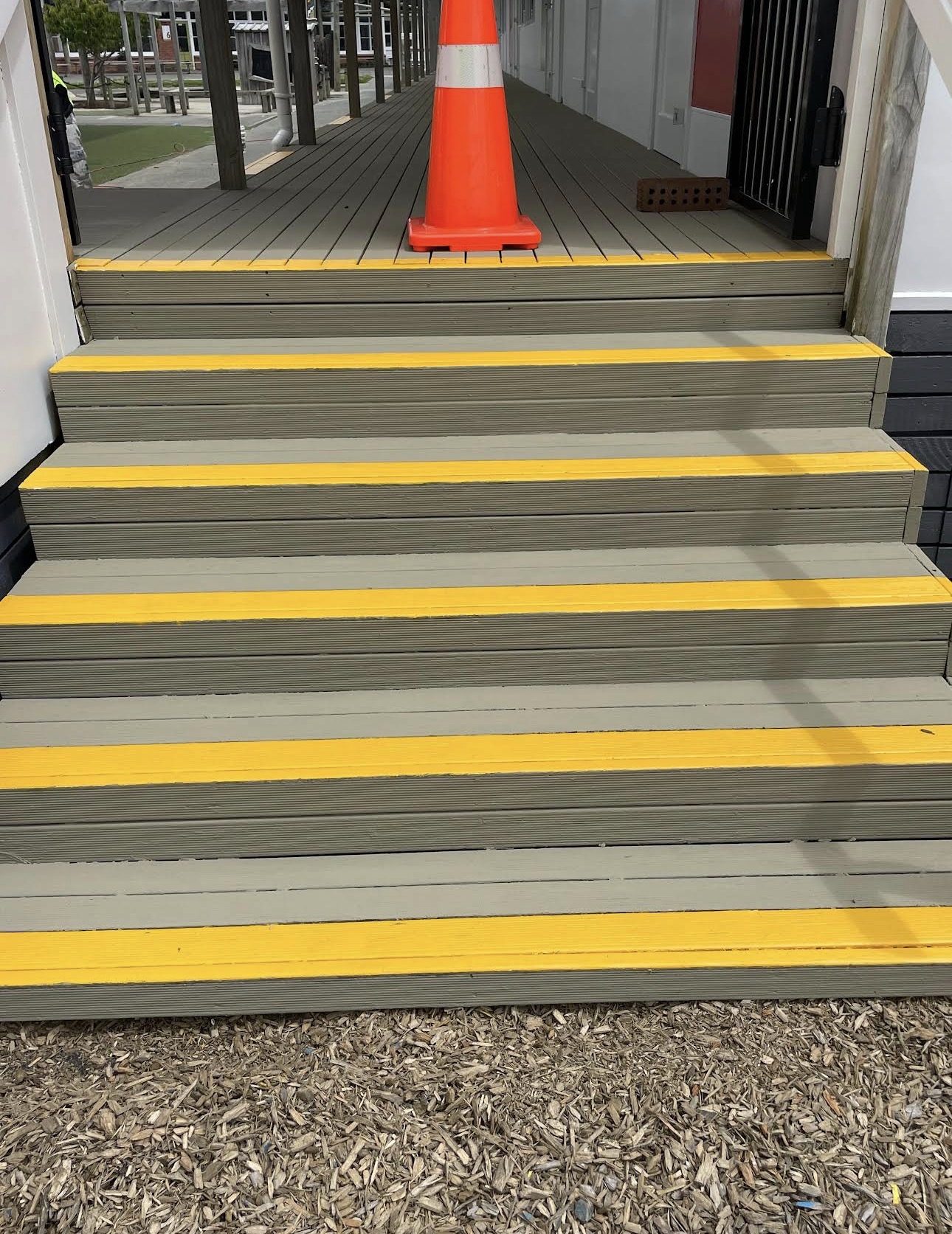School steps finished with yellow nosing markings on every tread